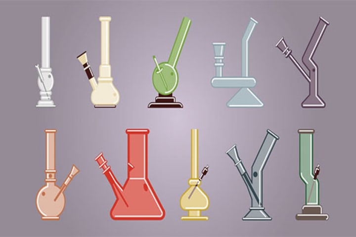 Ten colored bongs in assorted sizes against gray background