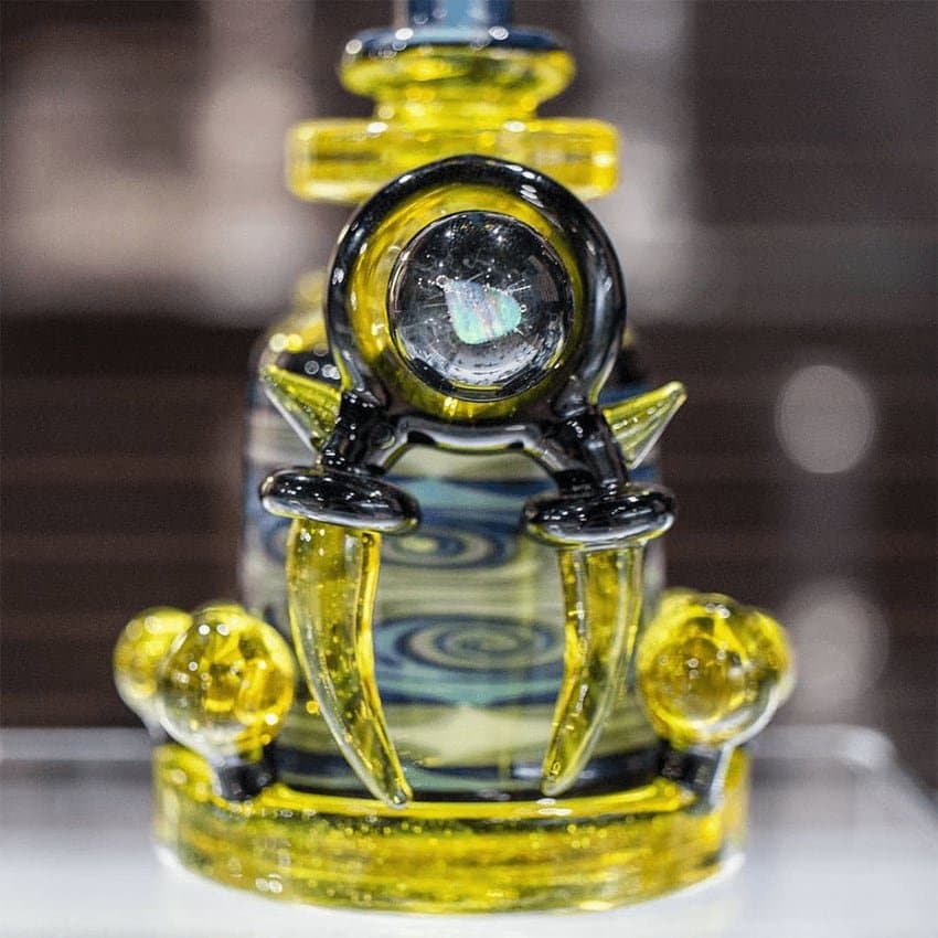Hedman heady glass recycler bong in yellow and black, close-up