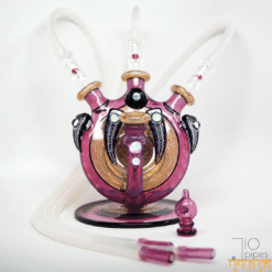 coojoglass x peetwiceglass x pakuaglass collab dab rig with opal accents, shown with hoses