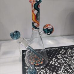 710 x PostGlass Filla flip beaker dab rig with orange and black swirl accents