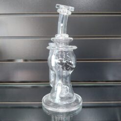 Phenomenon 50mm Wavy dab rig in clear glass, shown on display