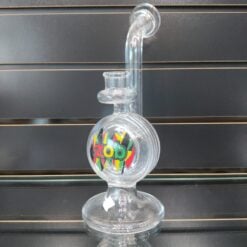 Zob Vert Zobello glass dab rig with round bubble chamber, shown on display