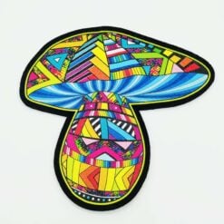 Moodmats Shroom V2, mushroom-shaped mat with a colorful geometric pattern
