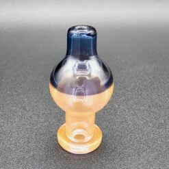 Zombie Hand two-tone bubble cap in clear and amber glass