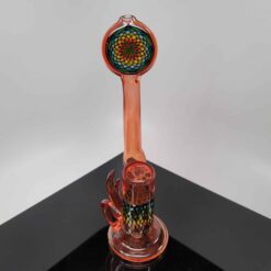 Glassmith Dual Fillacello Bubbler, pink glass bent-neck bubbler with a mandala medallion, front view