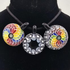 RL. Dots Dotstack pendants on cord necklaces, three dot pattern colorways shown