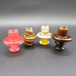 Kadabra Spinner Carb Cap shown in four colors together