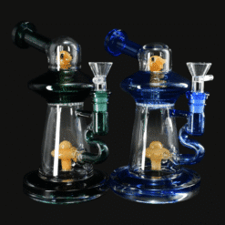 Alien Spaceship bong with alien figure in the chamber, shown together in two colors, 7.7-inch
