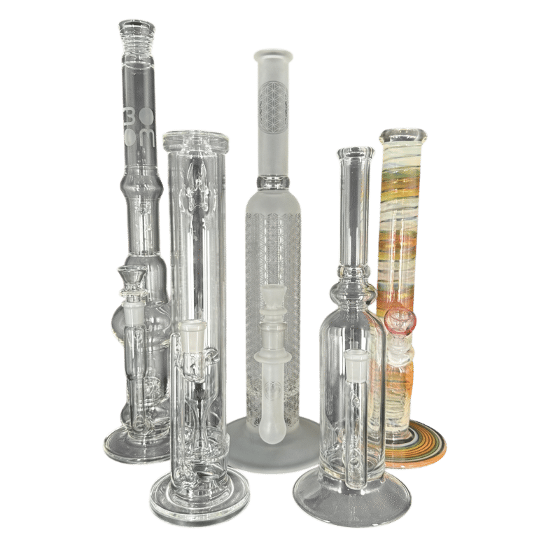 Assortment of tall glass water pipes and bongs in clear, smoky and fumed colors