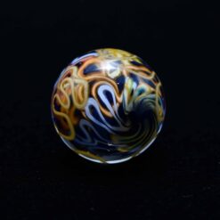 Charisma glass marble number 1, blue and orange swirl pattern