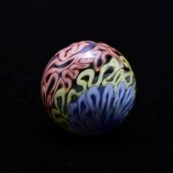 Charisma glass marble number 6, pink and green pattern