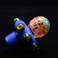 Charisma slurper spinner carb cap number 1 in blue, angled view