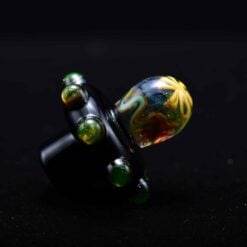 Charisma slurper spinner carb cap number 4 in black, angled view