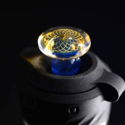 Gatez Glass 3DXL joystick cap number 1 in blue and gold, attached to the Peak Pro