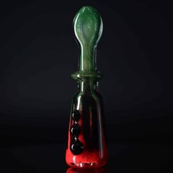 Goblin King black, green and red glass chillum with marble accents, standing upright