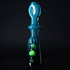 Goblin King teal and black glass chillum with marble accents, standing upright
