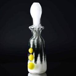 Goblin King black and white glass chillum with yellow marble accents, standing upright