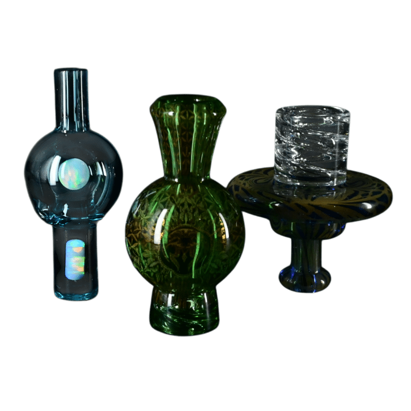 Assorted heady glass carb caps in blue, green and clear