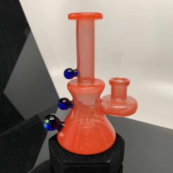 Happy Time Time Tube Color in orange, glass recycler tube with blue marble accents