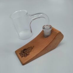 Campfire Quartz opaque bottom banger on a wood stand