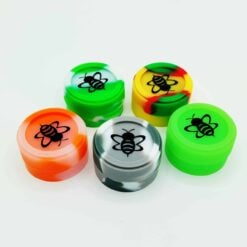 Silicone Puck dab containers shown in assorted colors