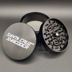 Santa Cruz Shredder Jumbo Grinder in black, pieces separated showing teeth