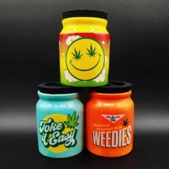 Happy Hemp ceramic stash jars in yellow, teal and orange