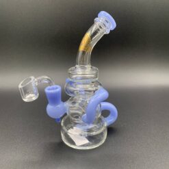 Illuminati Glass 7-inch recycler dab rig in blue, with banger attached