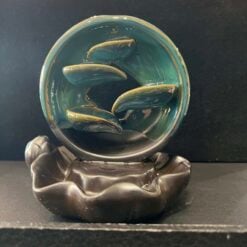 Sacred Shadows crystal ball backflow incense burner with a bronze base