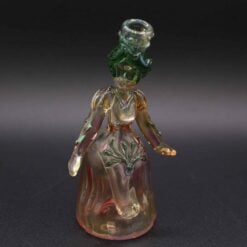 Lyric Princess Rig - Green, amber glass rig sculpted as a princess figure, front view