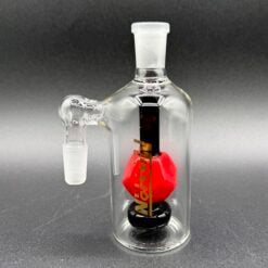 Million Glass Premium Ash Catcher Dice, clear glass ash catcher with a red dice accent, front view