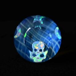 Kadabra 34mm Opal Marble, blue glowing opal glass marble with white swirl lines