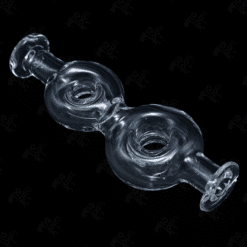 Kadabra Donut Pivot Top, clear glass double-donut top, lying at an angle