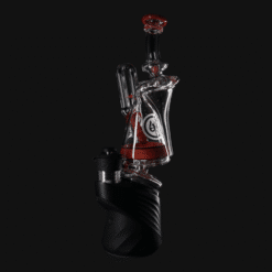 OJ Flame Puffco Peak beaker recycler in Tequila Sunrise red, 8.5-inch, on the device