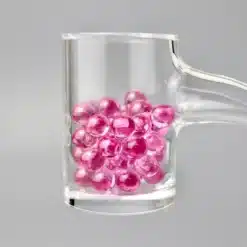 Ruby Pearl Co Pink Sapphire Pearl Set, glass mug filled with pink terp pearls