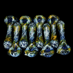 Four Schutz Glass Swirly Fume spoon pipes in gold and silver fume over cobalt blue, shown together