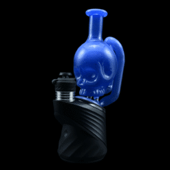 Shaggy Skull Peak Top #1, blue skull-shaped glass top attached to a black textured electric dab rig base