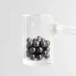 Ruby Pearl Co Silicon Carbide Pearl Set, glass mug filled with dark metallic pearls