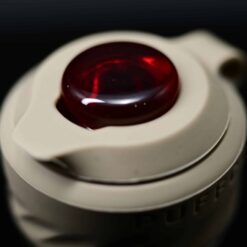 Zombie Hand Peak Pro Oculus cap in red on a Puffco Peak Pro base