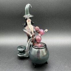 Rich Villa Witches Get Stoned recycler, witch figure seated on a cauldron, front-left view