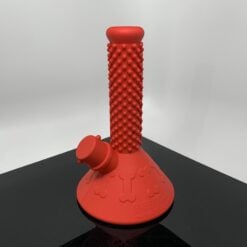 Puff Palz Beaker Buddy silicone chew toy in red, beaker shape