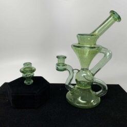 Blob Glass Citron recycler dab rig shown with its matching carb cap