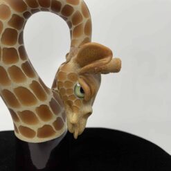 Robertson Bent Neck Giraffe Rig, tan glass rig sculpted as a giraffe head and neck, side view