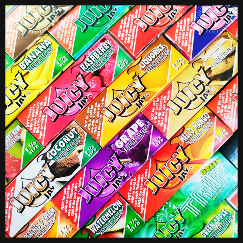 Assortment of Juicy Jay's flavored rolling papers in bright colored packs