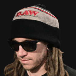 RAW knit beanie in black, worn by a model