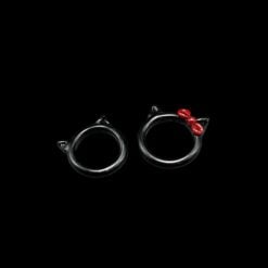 Marni Character heady glass rings in black with red accents, pair shown together