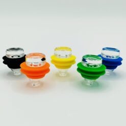 Puffco Peak Pro carb caps in black, yellow, blue and green