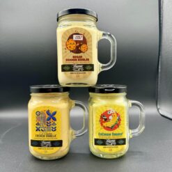 Beamer Smoke odor-eliminating candles shown in three scents