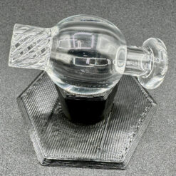 Gordo Riptide Bubble Cap, clear glass carb cap with spiral ribbed design on display stand